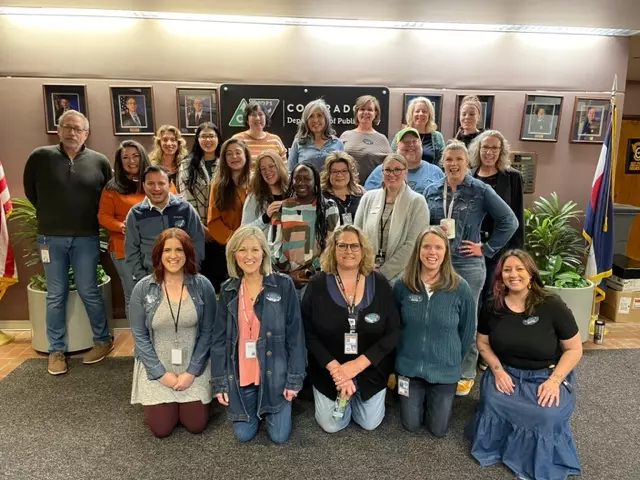 DCJ staff wearing denim in support of taking a stand against sexual violence
